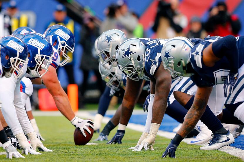 The New York Giants offensive line squares off against the Dallas Cowboys defensive line...