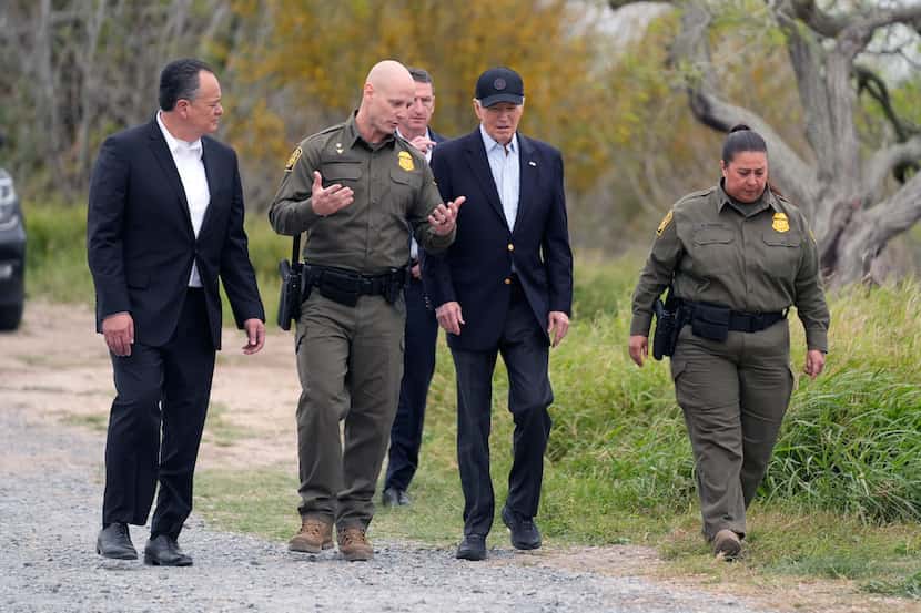 President Joe Biden, center, looks over the southern border, Thursday, Feb. 29, 2024, in...