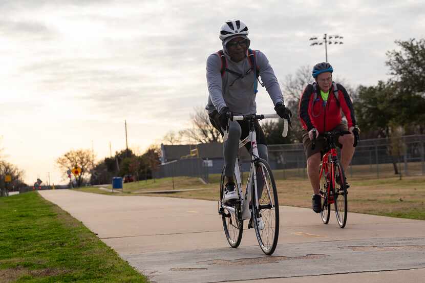 Cyclists bike down Santa Fe Trail on Jan. 3, 2020 in Dallas. The LOOP trail will connect the...