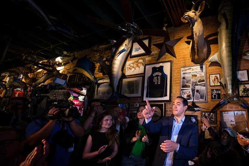 Presidential candidate Julian Castro acknowledges the hosts for a campaign event at St....