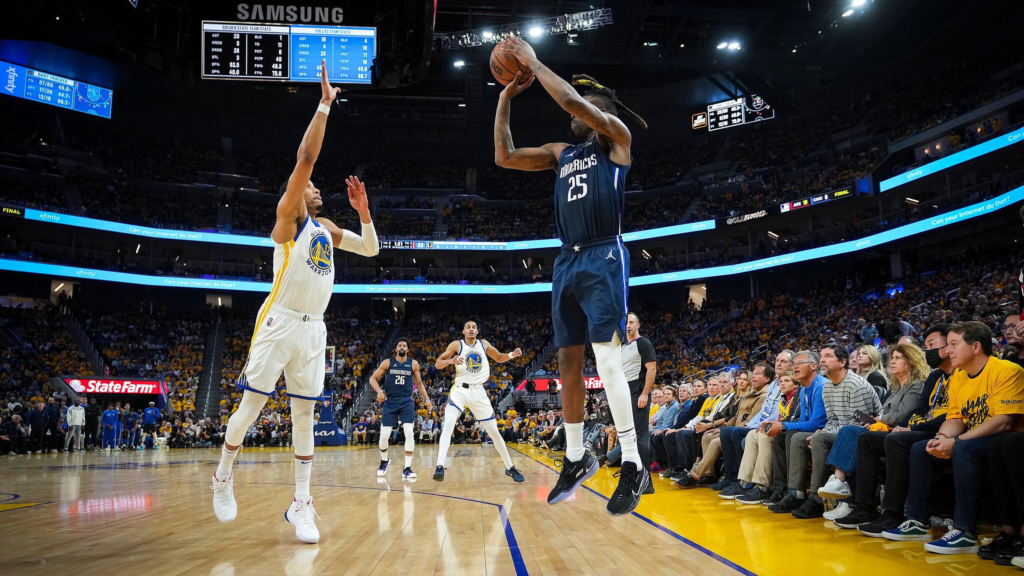 Dallas Mavericks forward Reggie Bullock (25) puts up a 3-point attempt as Golden State...