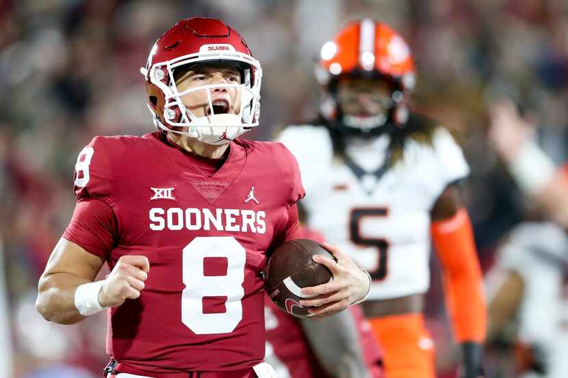 Oklahoma quarterback Dillon Gabriel (8) yells while scoring a touchdown during the first...