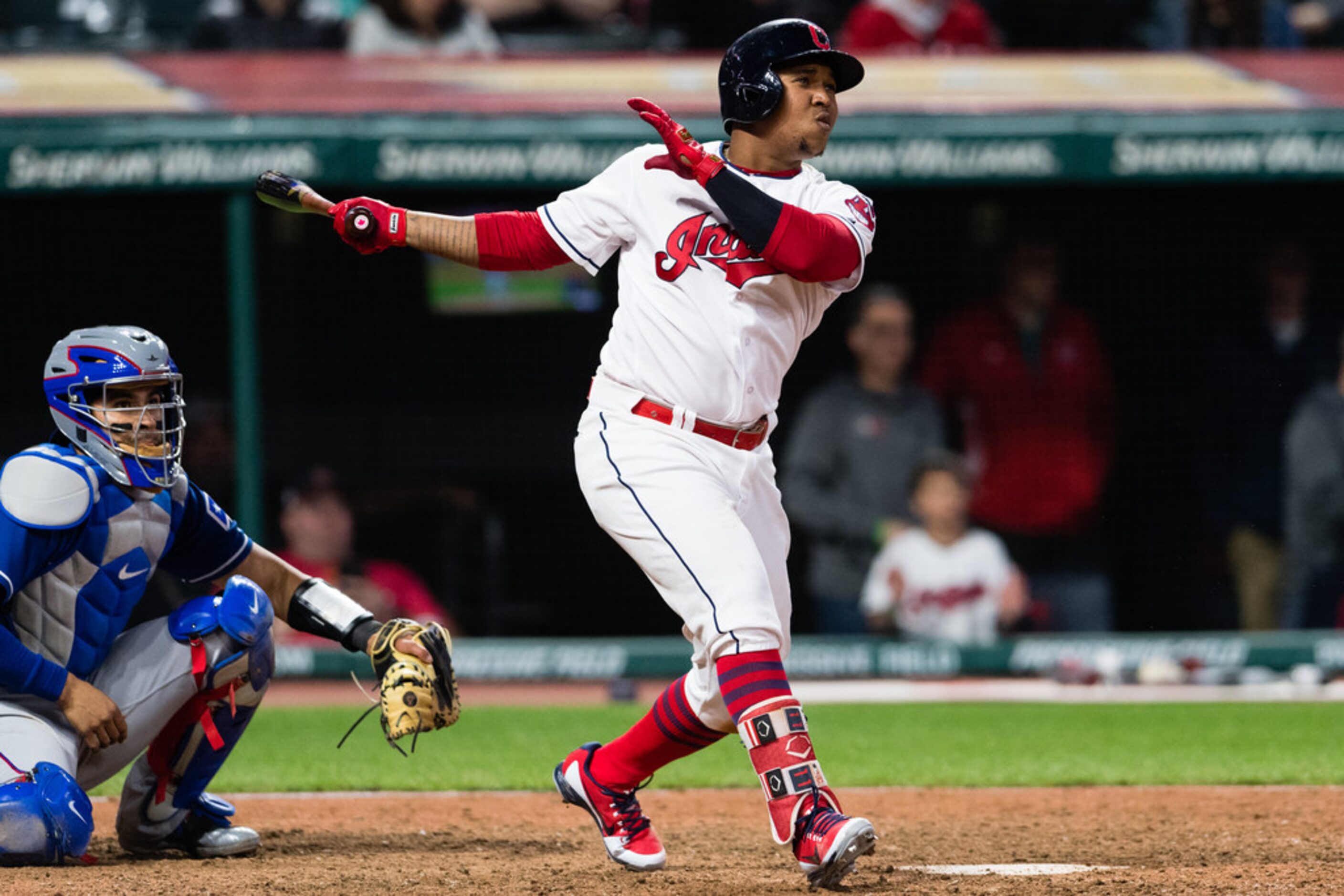 CLEVELAND, OH - APRIL 30: Jose Ramirez #11 of the Cleveland Indians hits an RBI single...