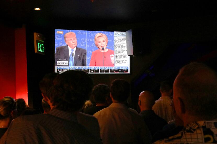 San Franciscans attend a watch party Monday night for the first presidential debate between...