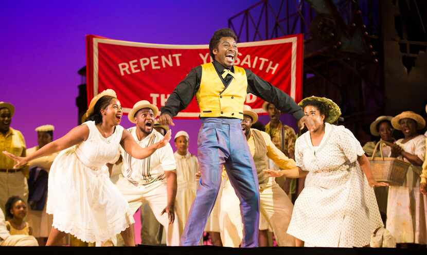 Jermaine Smith, who plays Sportin' Life, and the chorus perform during a dress rehearsal.