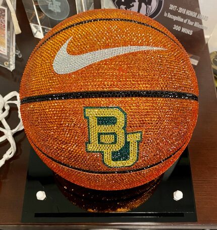 Nike co-founder Phil Knight sent a life-sized crystal basketball with the Baylor logo.