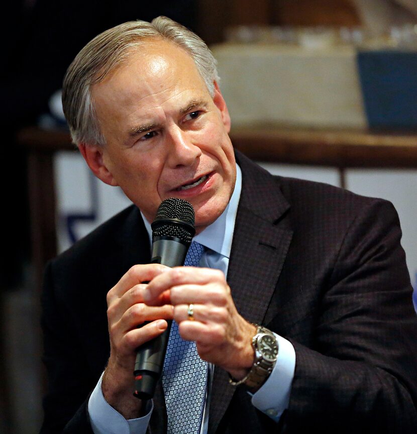 
Texas Gov. Greg Abbott speaks to a crowd at Pecan Lodge Thursday, September 17, 2015 in...