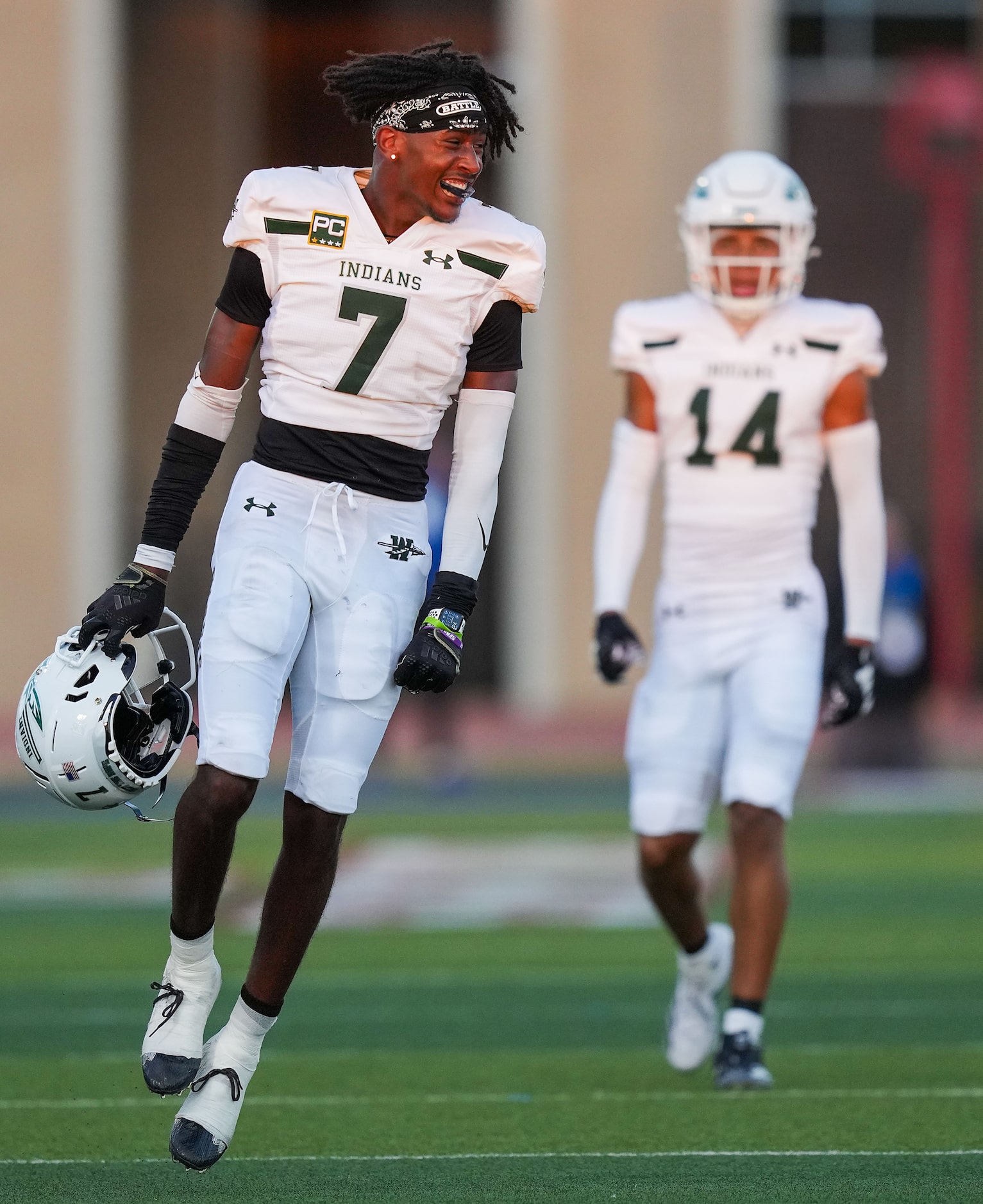 Waxahachie cornerback Elijah Thompson (7) celebrates after a defensive stop during the first...