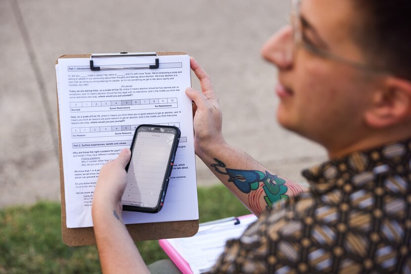 Avow Texas canvasser and Disruptor Collaborative consultant Jules Mandel uses an app to...