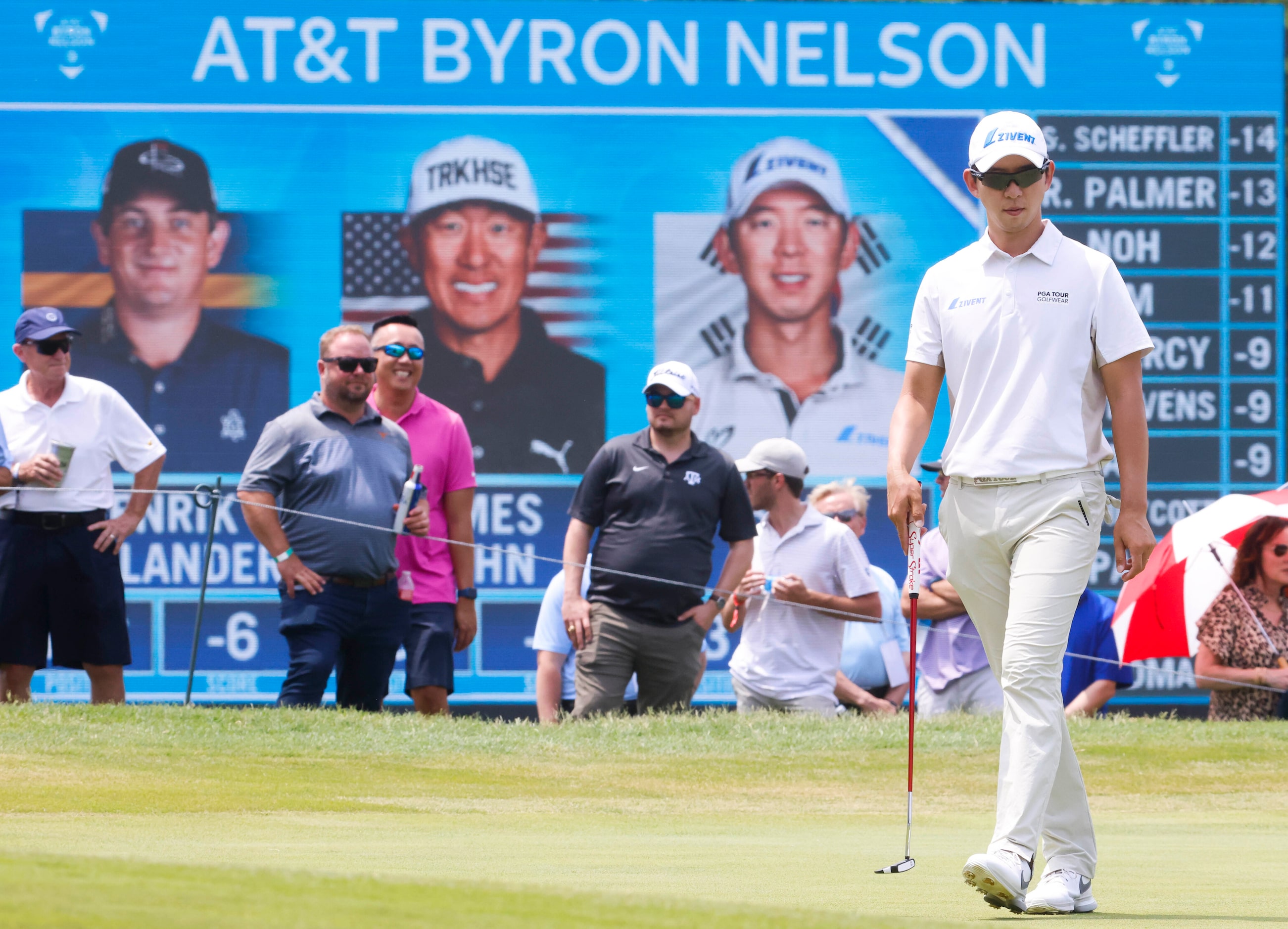 S.Y. Noh of South Korea walks off after he putts on the 18th hole green during the second...