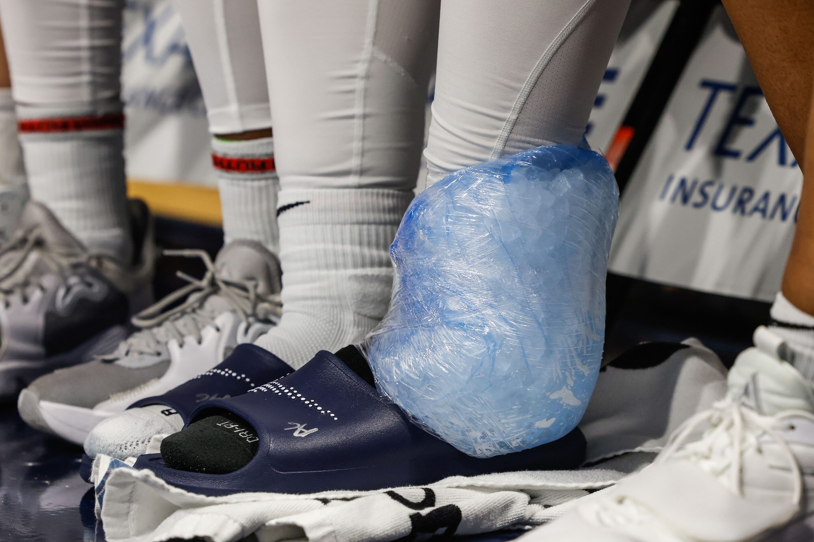 Dallas Wings guard Allisha Gray (15) ices her ankle during the second half at the College...