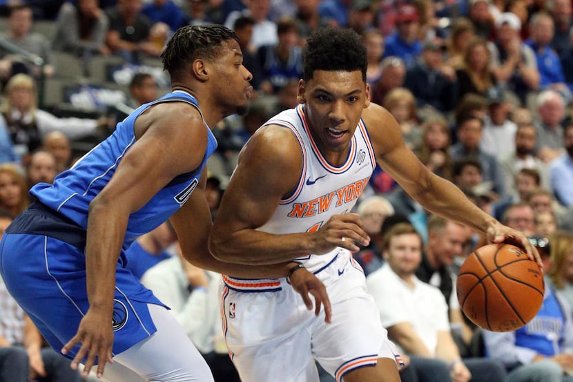 Dallas Mavericks guard Dennis Smith Jr. (1) defends as New York Knicks guard Allonzo Trier...