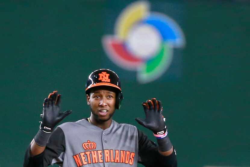 Netherlands' Jurickson Profar reacts at second after hitting a double against Cuba during...