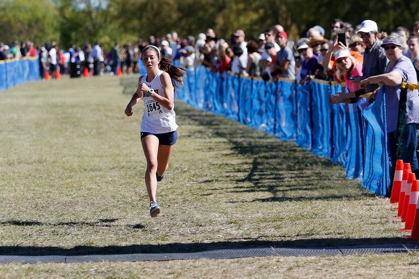McKinney North's London Culbreath (1645) approaches the finish line finishing in first place...