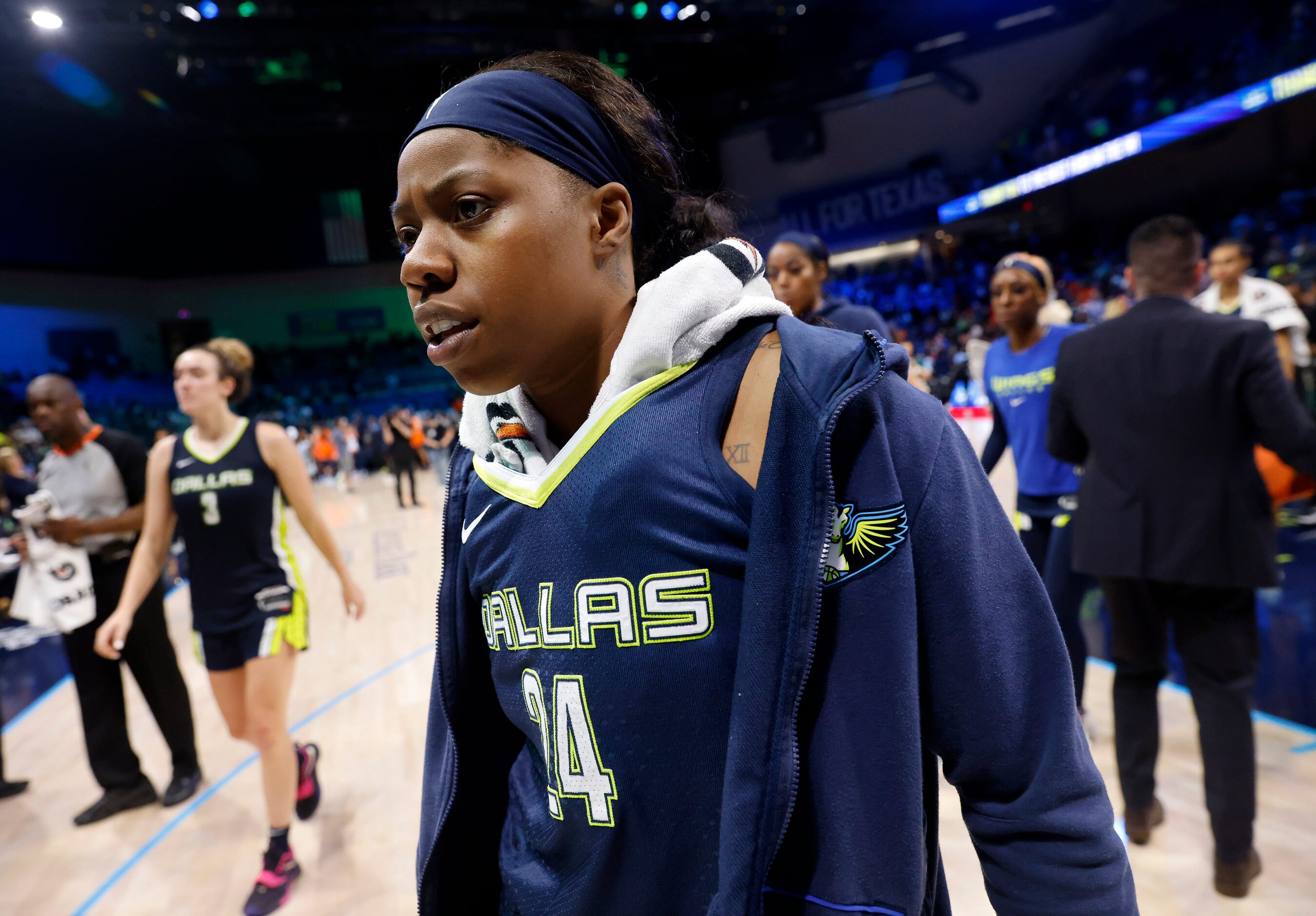 Dallas Wings guard Arike Ogunbowale (24) walks to locker room following their deciding game...