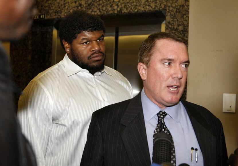 Josh Brent and one of his attorneys, George Milner III, spoke with reporters at hearing...