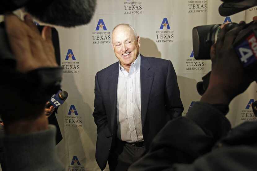 Former Texas Rangers president Nolan Ryan, talks to the media, as he made his first...