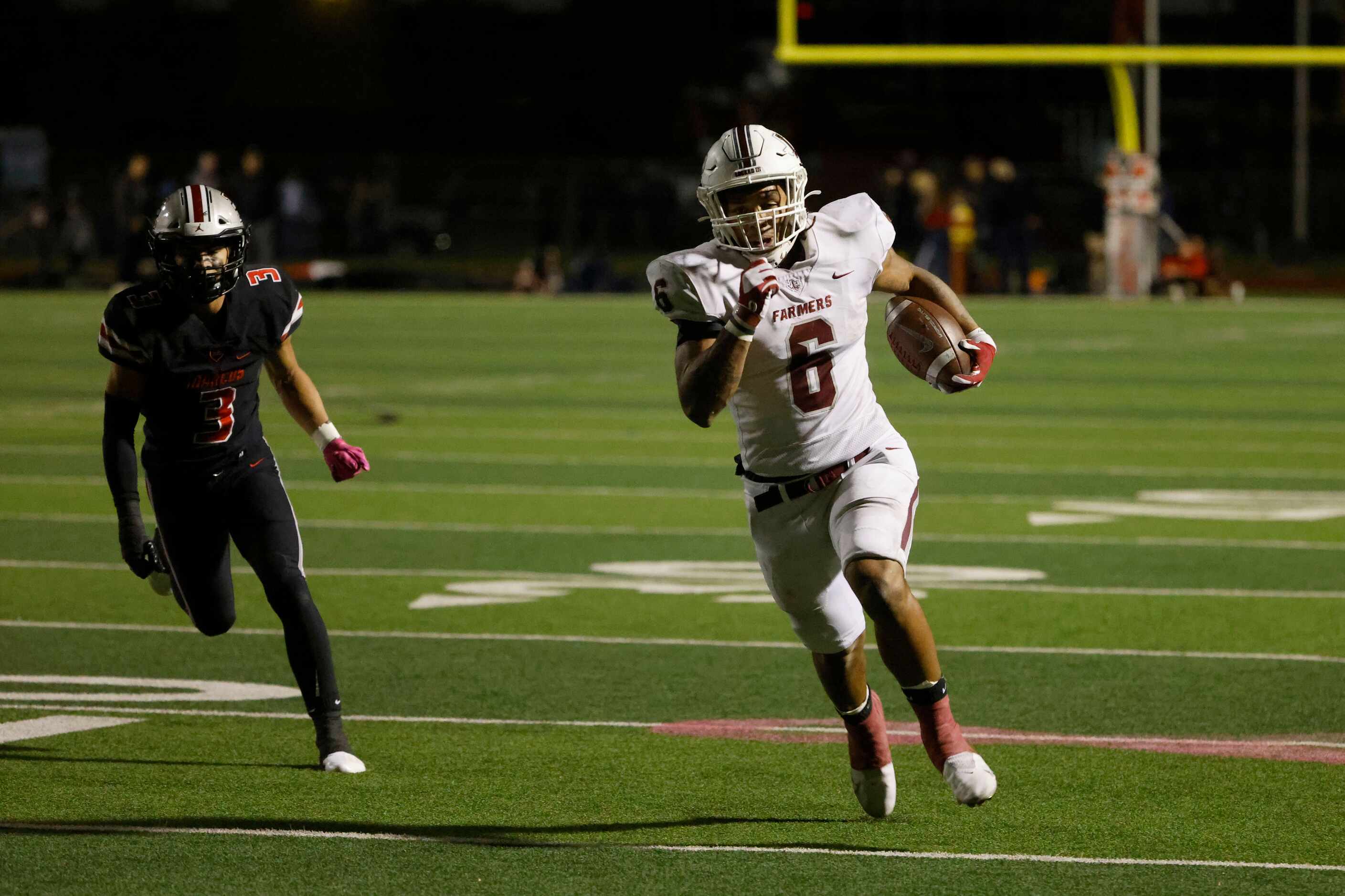 Lewisville’s Damien Martinez (6) scores a rushing touchdown as he is chased by Flower Mound...