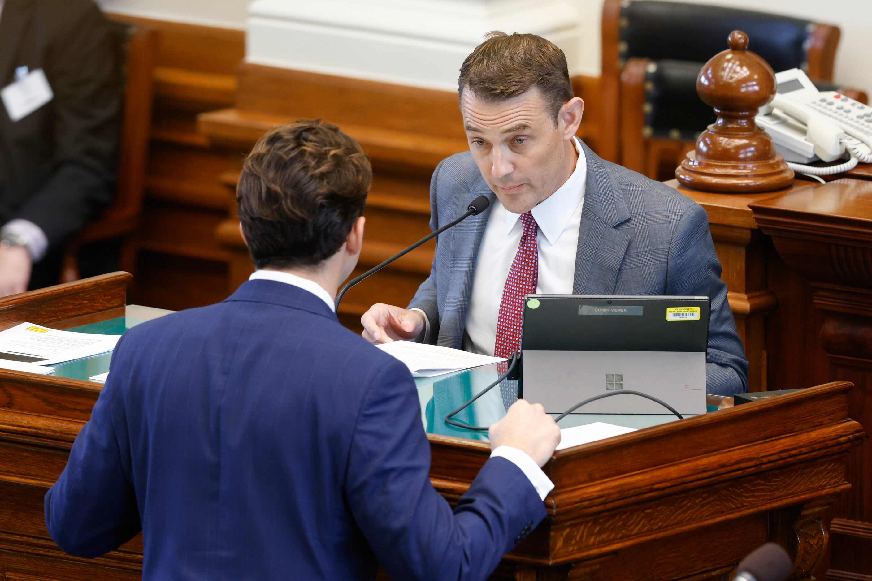 Anthony Osso, Jr., attorney for Texas Attorney General Ken Paxton, approaches the witness...