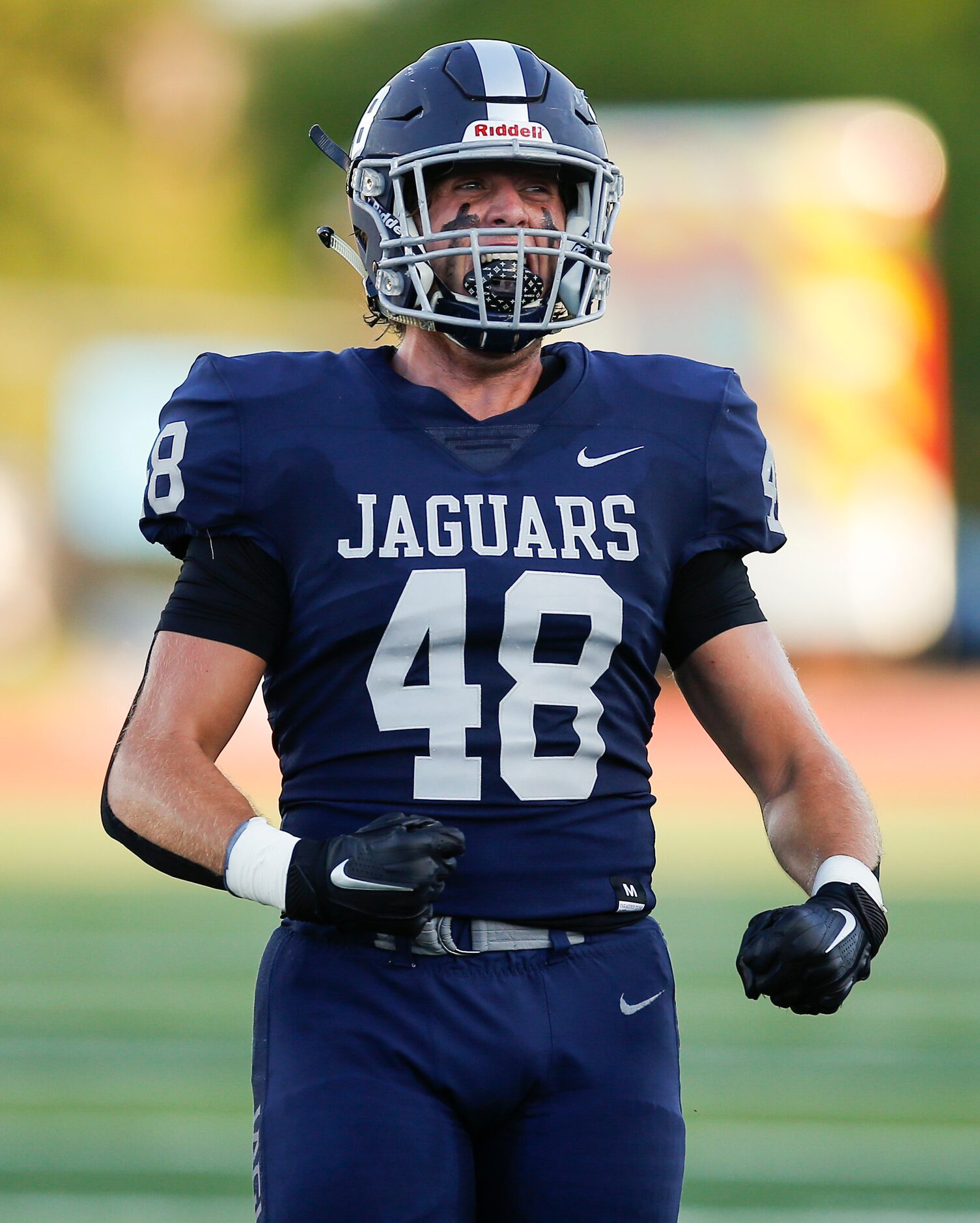 Flower Mound senior defensive end Tristan Mallouf (48) celebrates a fourth down stop during...