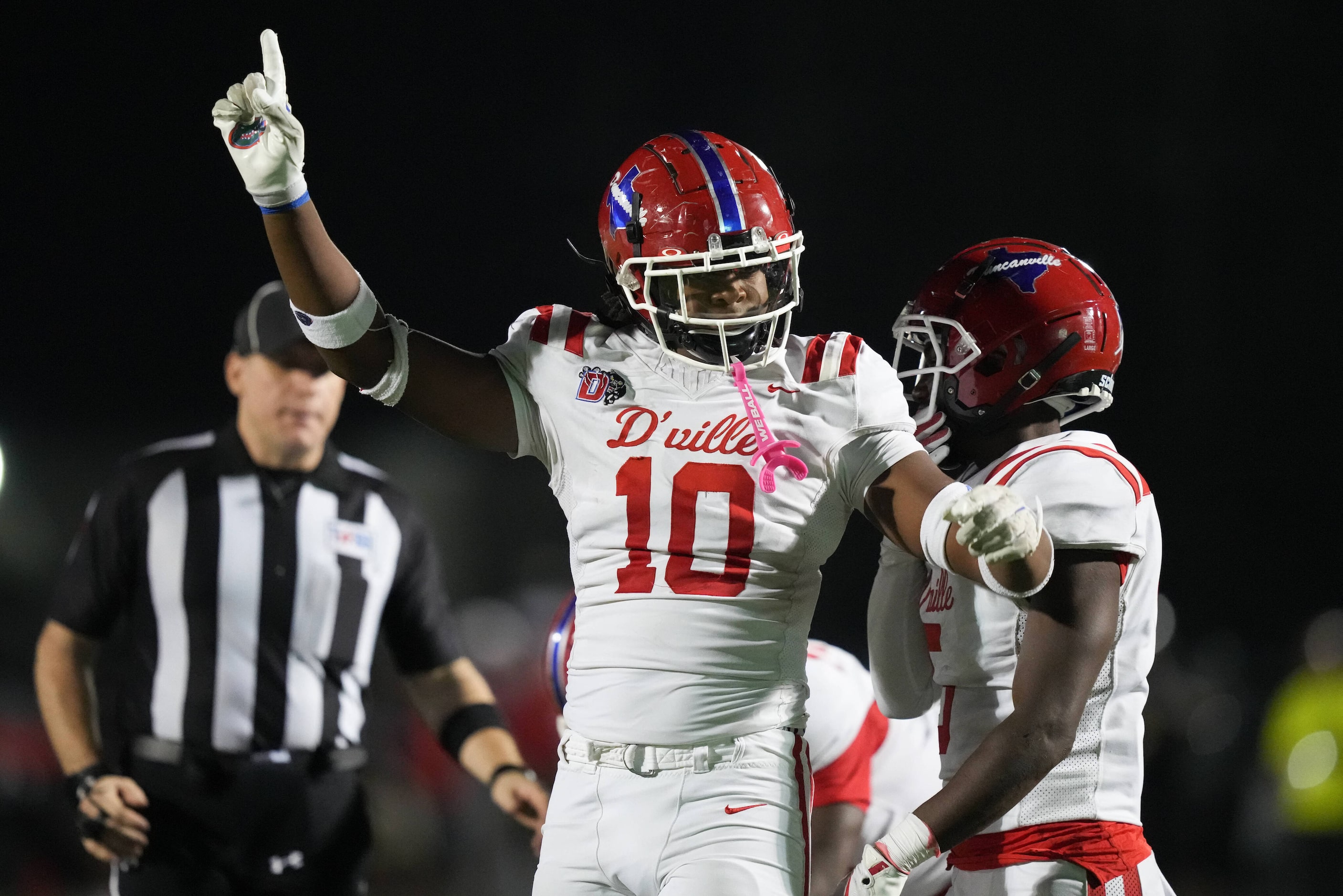 Duncanville defensive lineman Kevin Ford Jr. (10) celebrates after a defensive stop during...