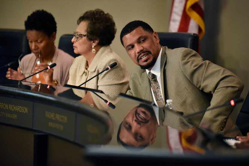 Former DeSoto city manager Tarron Richardson says Mayor Curtistene McCowan (seated left of...