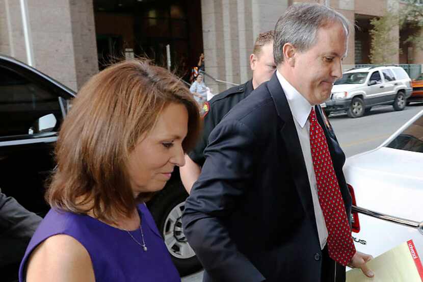  Texas Attorney General Ken Paxton and his wife, Angela, arrived Thursday at the Tim Curry...