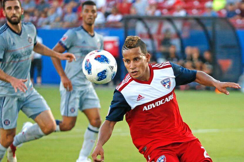 FC Dallas midfielder Michael Barrios (21) keeps his eye on the ball in the offensive zone in...
