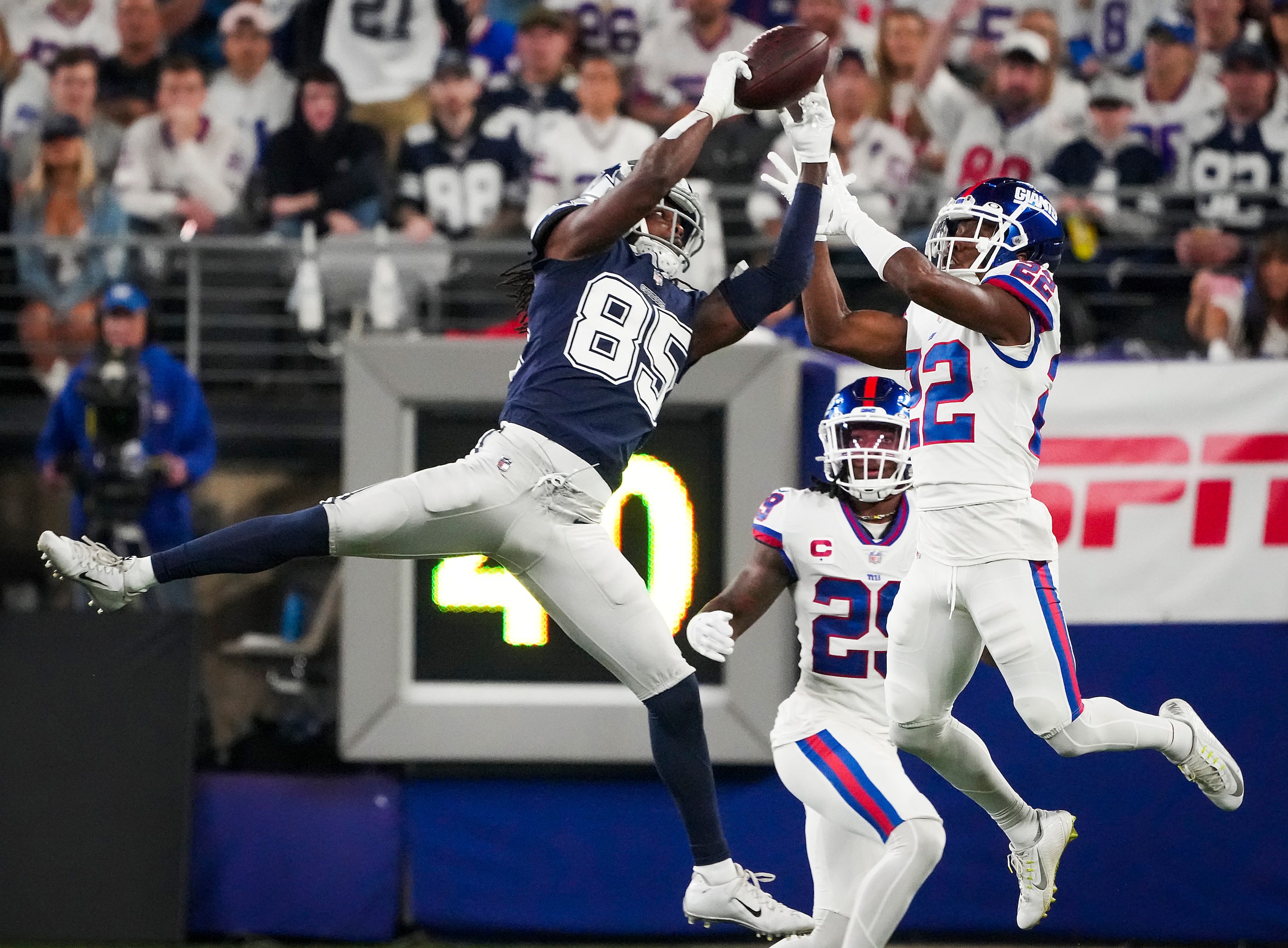 Dallas Cowboys wide receiver Noah Brown (85) catches a pass as New York Giants cornerback...