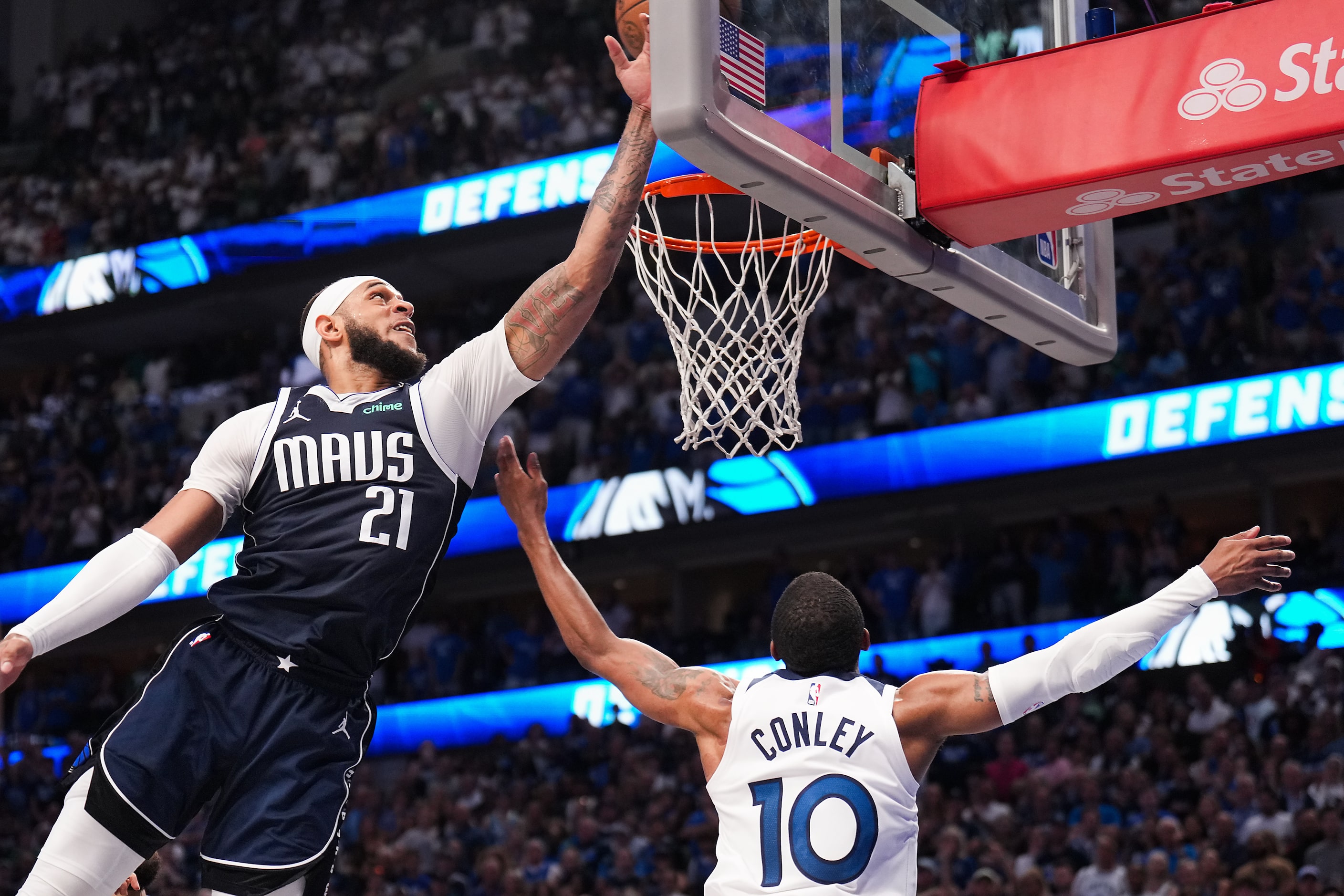 Dallas Mavericks center Daniel Gafford (21) blocks a shot by Minnesota Timberwolves guard...