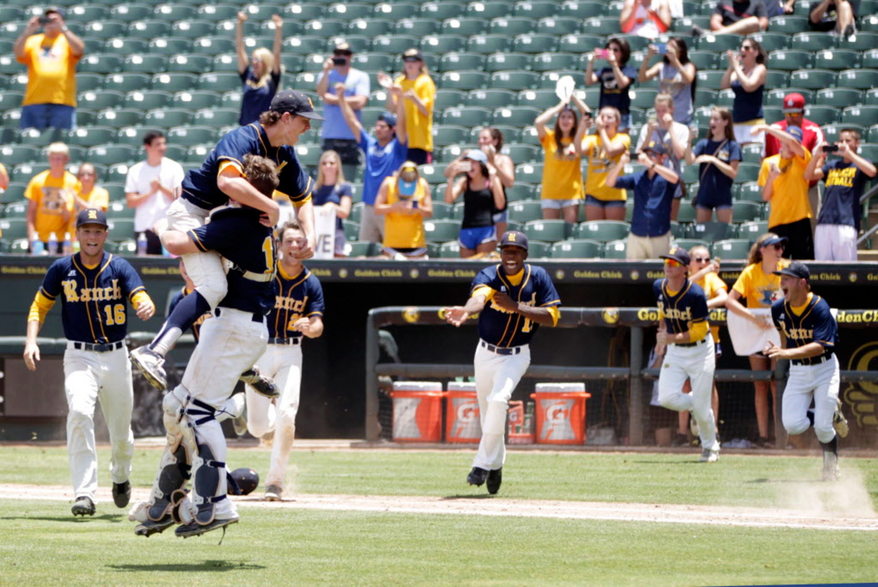 Cypress Ranch's Tyler Bielamowicz (17) and Marshall Skinner (13) celebrate as their...