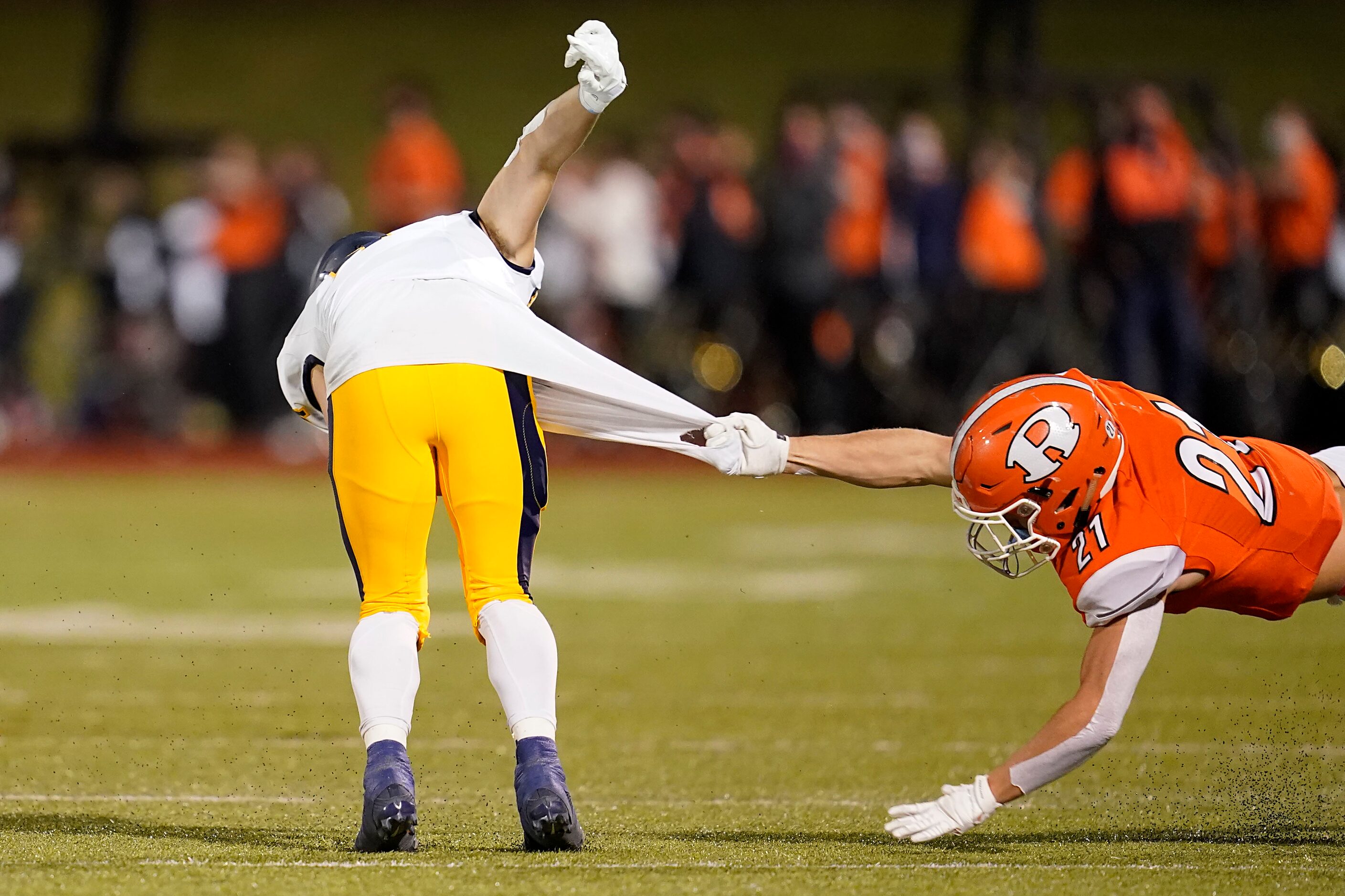 Highland Park wide receiver Crockett Corwin (4) pulls away from Rockwall defensive back Drew...