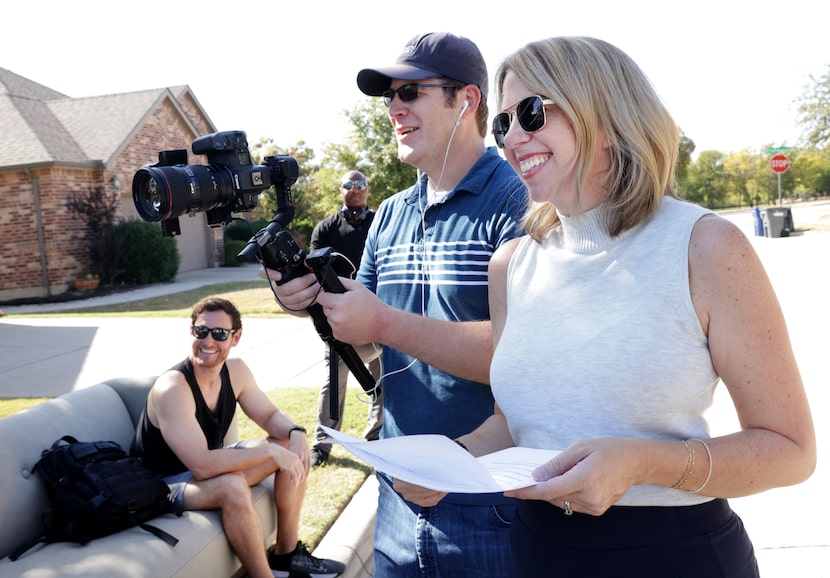 Joey Barr operates a camera as Meredith Haynes directs a video for the city of McKinney's...