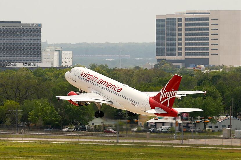  A Virgin America jet takes off from Love Field in Dallas (Tom Fox/Staff Photographer)