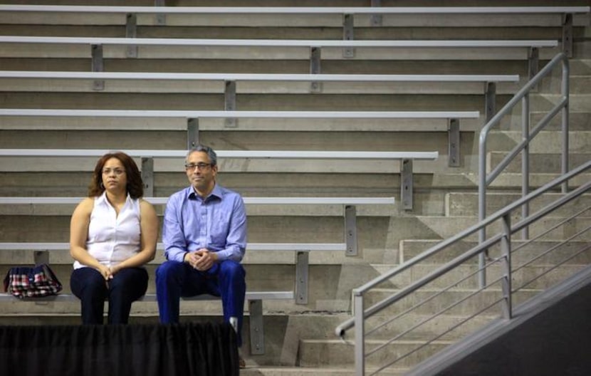 
Menique Hopkins Madison, watching with husband William as their sons rehearse their...