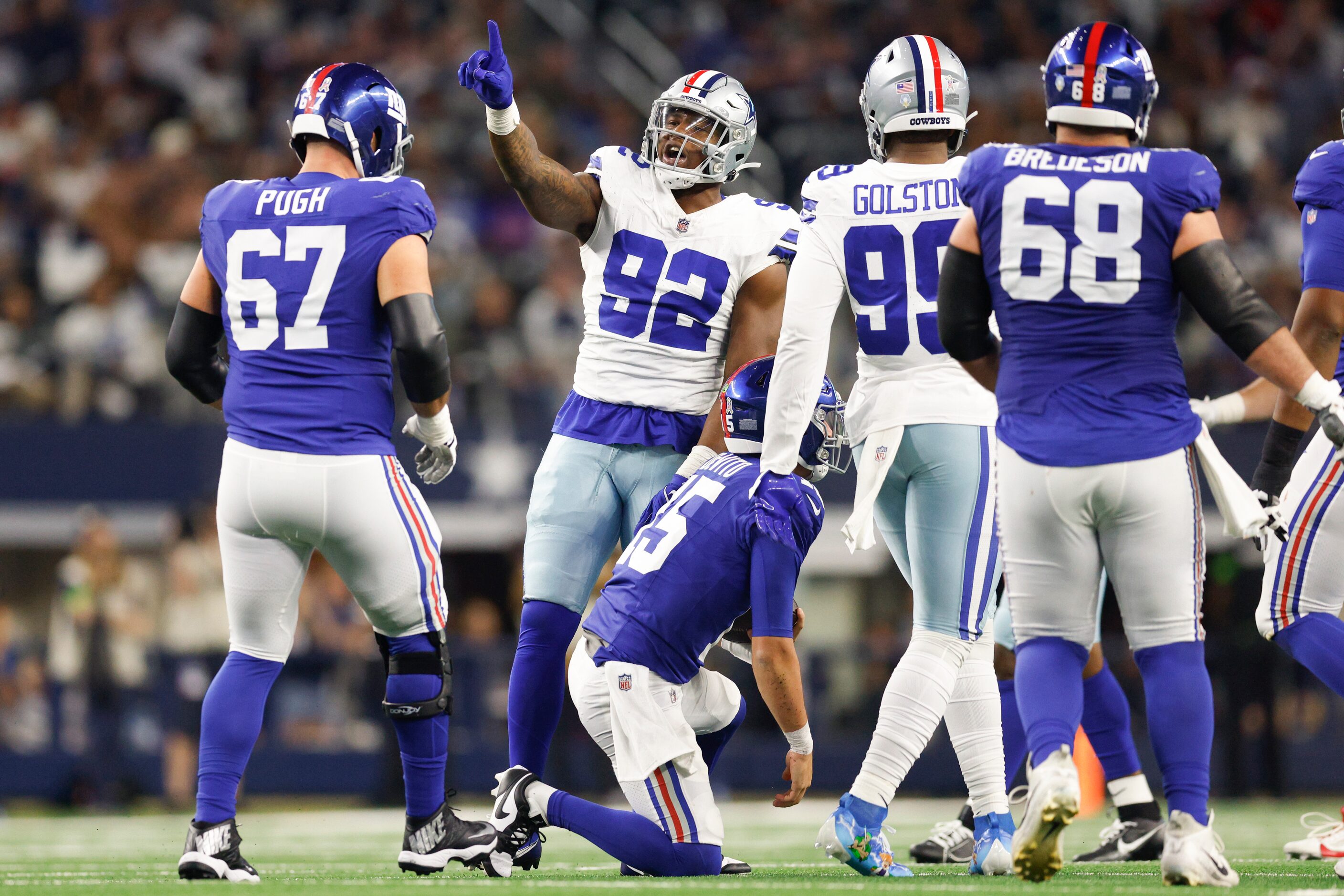 Dallas Cowboys defensive end Dorance Armstrong (92) celebrates after sacking New York Giants...