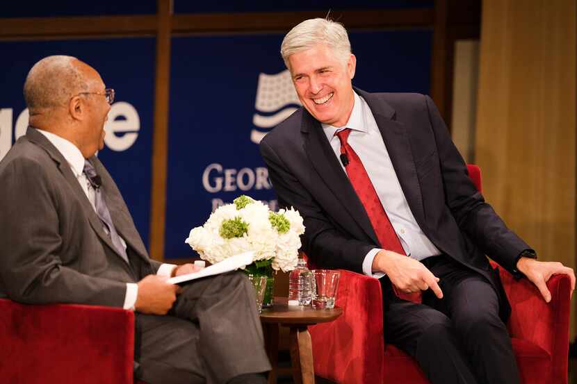 Supreme Court Justice Neil Gorsuch (right) speaks with moderator Larry D. Thompson at the...