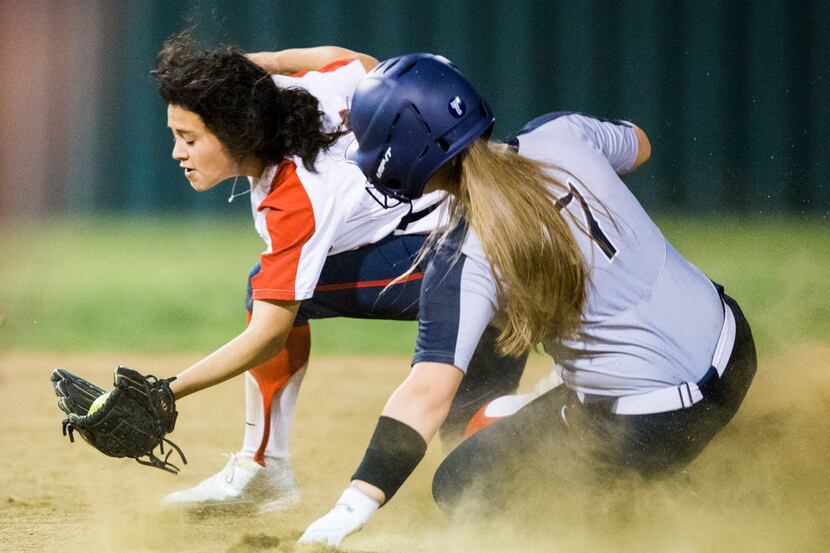 Frisco Lone Star's Hayley Peterson (7) makes it safely to second base ahead of Frisco...
