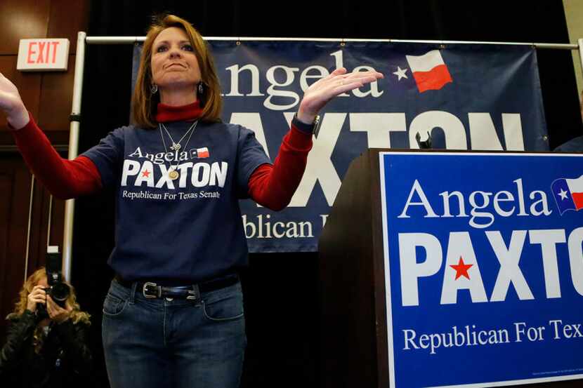 Then-candidate Angela Paxton acknowledged the applause of supporters at her election return...