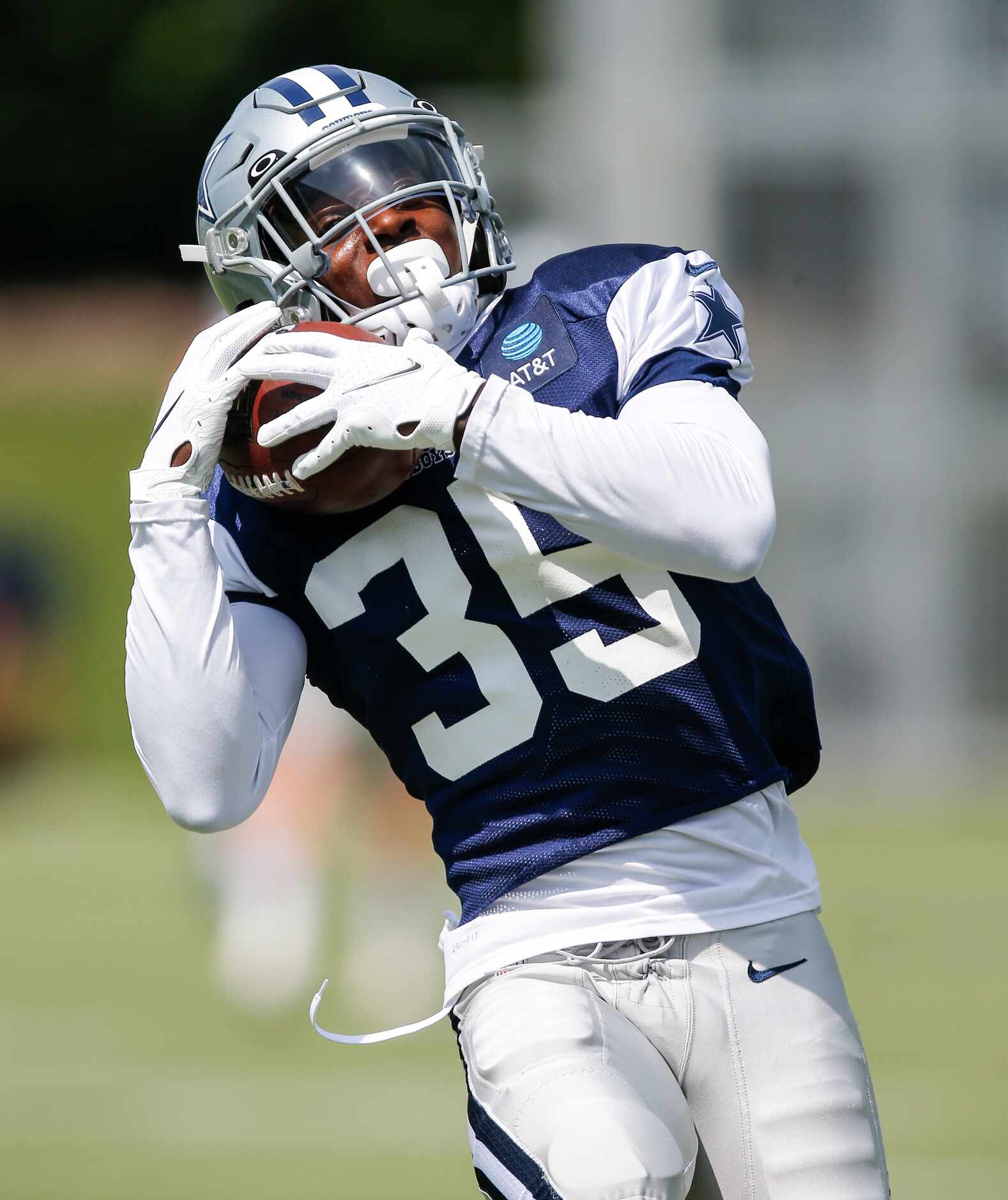 Dallas Cowboys safety Damontae Kazee (35) catches a pass during practice at The Star in...