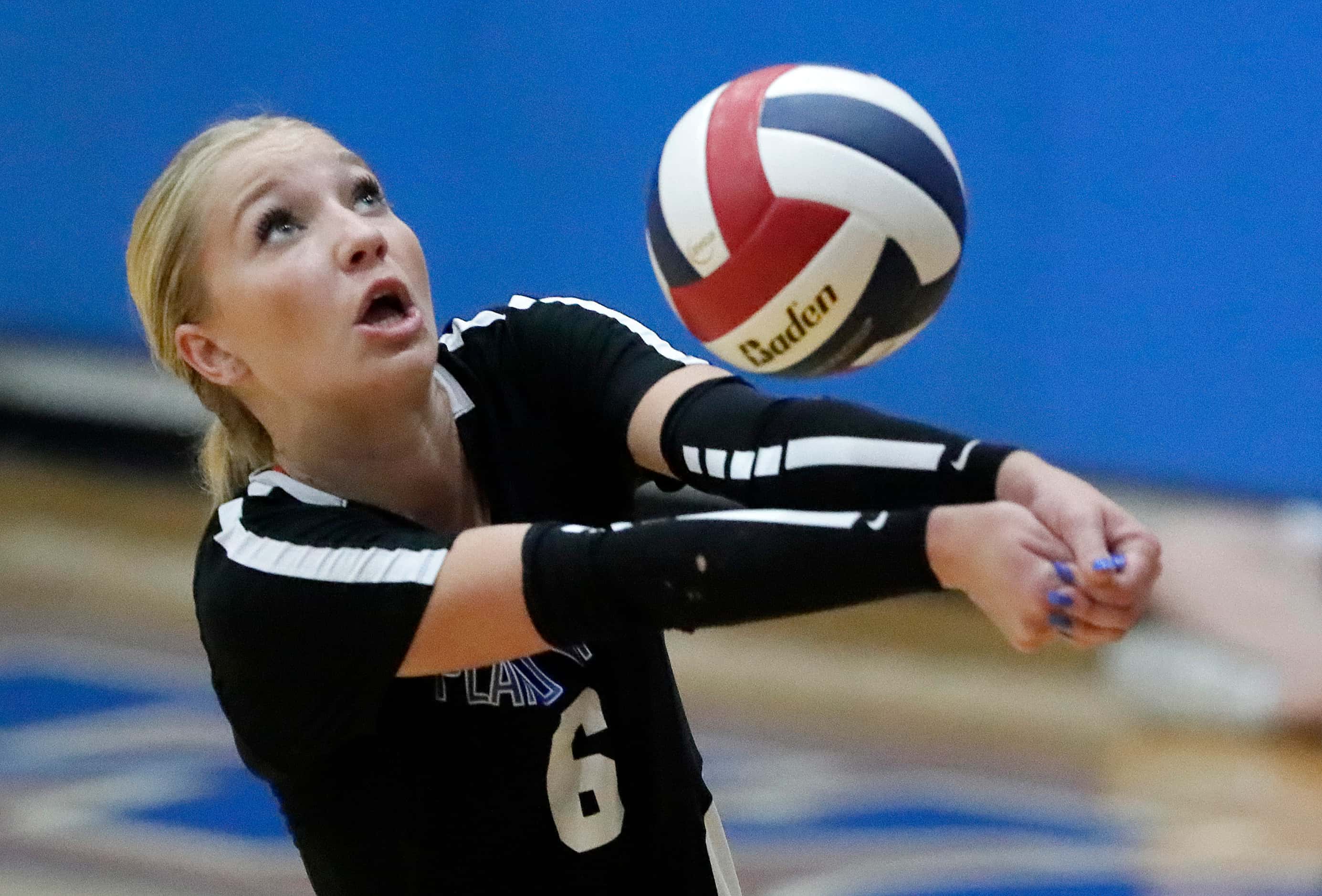 Plano West High School outside hitter Blaire Bowers (6) makes a pass during game one as...