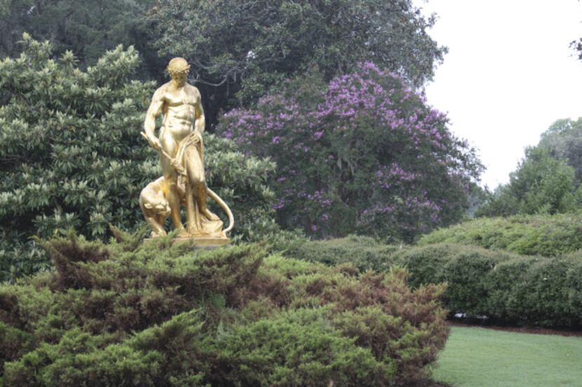 Sculptures are showcased among lush plants at Brookgreen Gardens near Myrtle Beach, South...