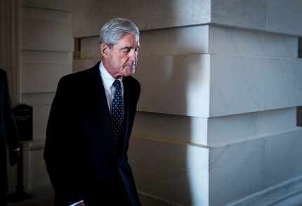 Robert Mueller, the special counsel leading the Russia investigation, leaves the Capitol in...