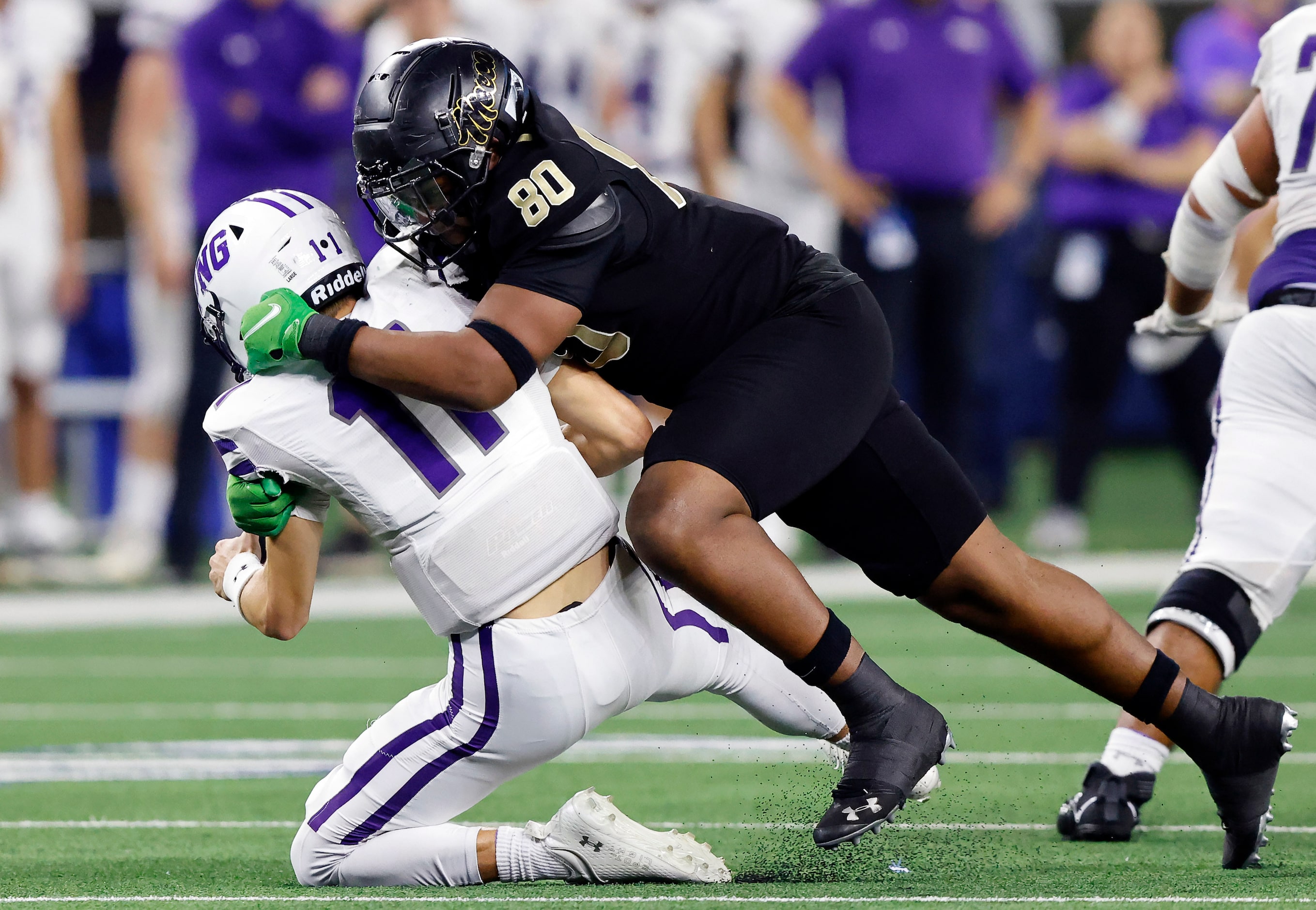 South Oak Cliff defensive lineman Keith Smith (80) sacks Port Neches-Grove quarterback Cole...