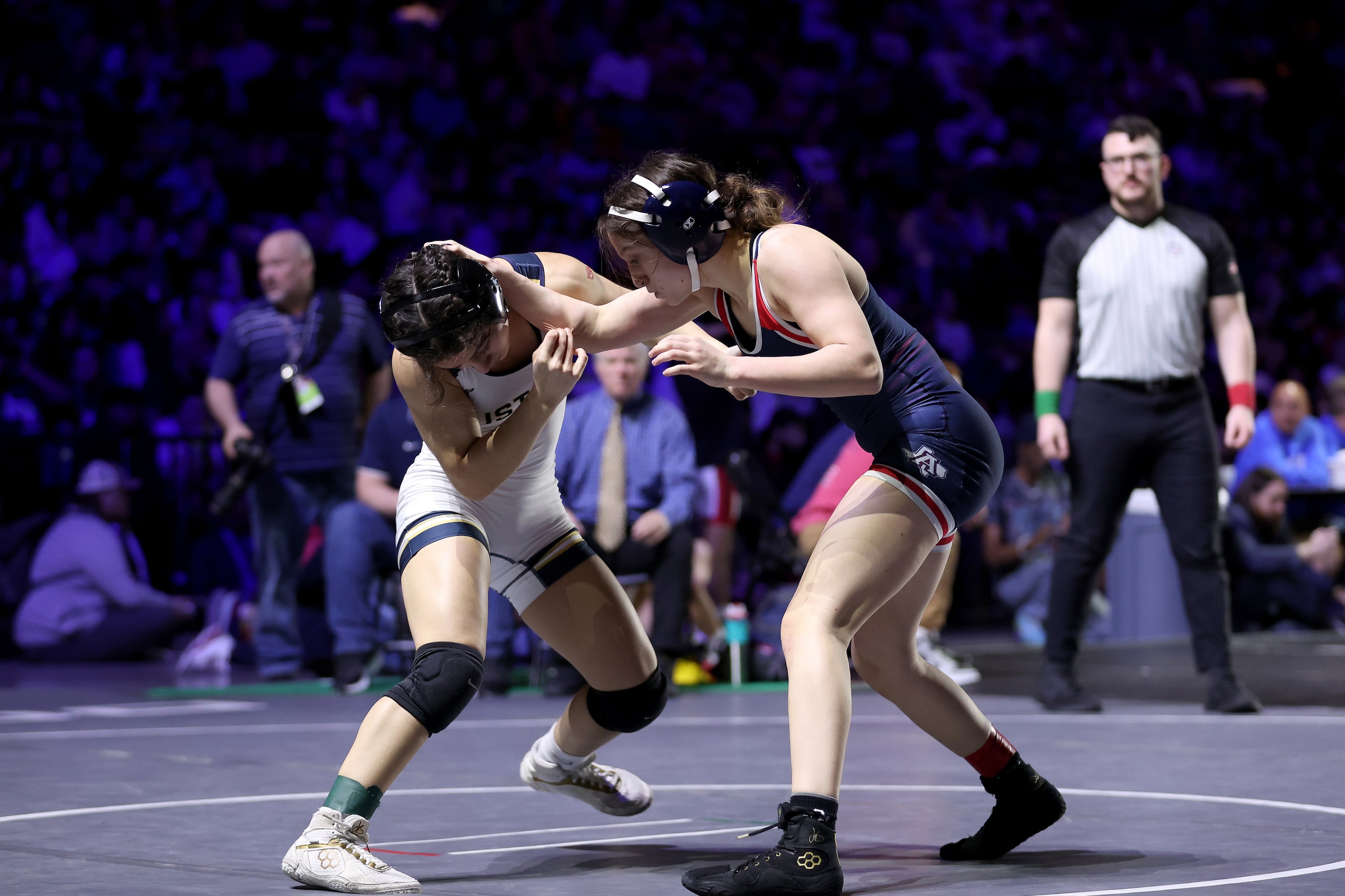 Grace Romans of Allen (blue) competes against Arianna Beltran of Cypress Ranch in the Girls...