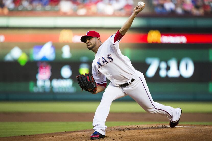 Texas Rangers starting pitcher Martin Perez pitches during the first inning against the New...