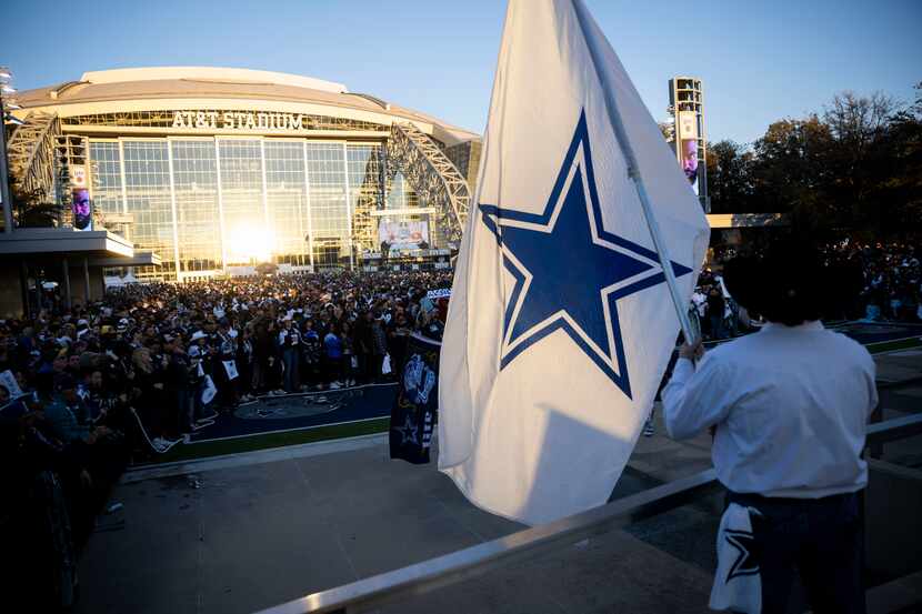Dallas Cowboys fan wait to watch their team take on the San Francisco 49ers in the...