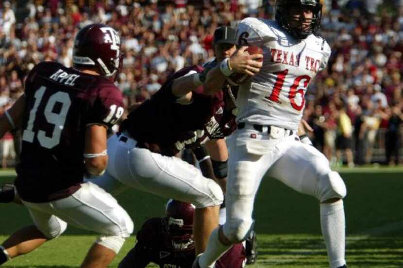 Texas Tech's quarterback Kliff Kingsbury runs out of bounds deep in A&M territory during...