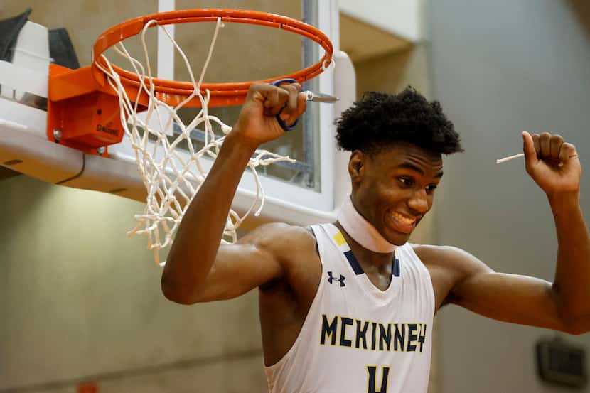 McKinney’s Ja'Kobe Walter (4) reacts after cutting the net after they defeated Arlington...