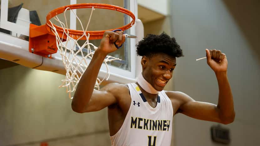 McKinney’s Ja'Kobe Walter (4) reacts after cutting the net after they defeated Arlington...